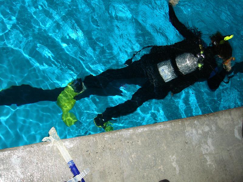 DSC02265 I'm playing a sort of underwater volleyball with the other divers. We have a little yellow rubber torpedo which has neutral buoyancy, and can be basically thrown underwater along a straight line. It's a lot of fun, it's by all means similar to being in absence of gravity.
