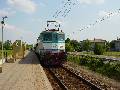 FS locomotive 424 296 with a local train leaving Madignano (Cremona)
train-stop for Cremona on May 16th, 2003.